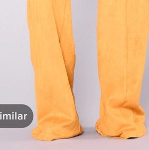 Mustard Slacks never worn still in its original packaging.